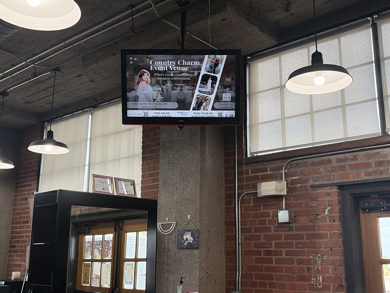 BrightLoop Media advertising screen inside a local hair salon